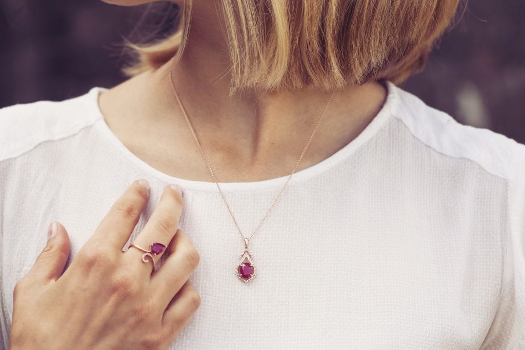 woman wearing birthstone january garnet jewelry