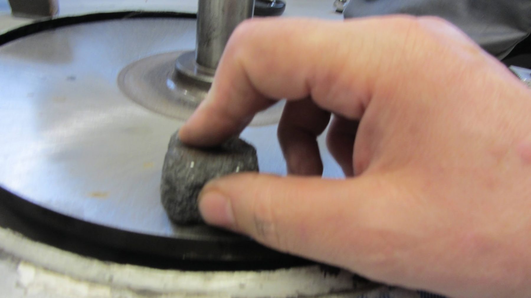 pumice stone on polishing wheel