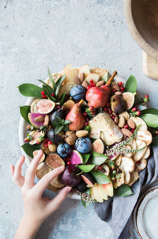 Assorted fruits on platter.