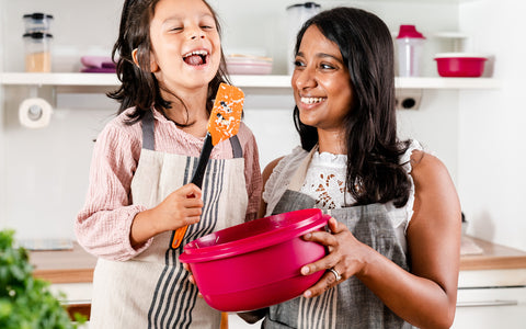 Mother and Daughter with Baking Bowl and Spatula