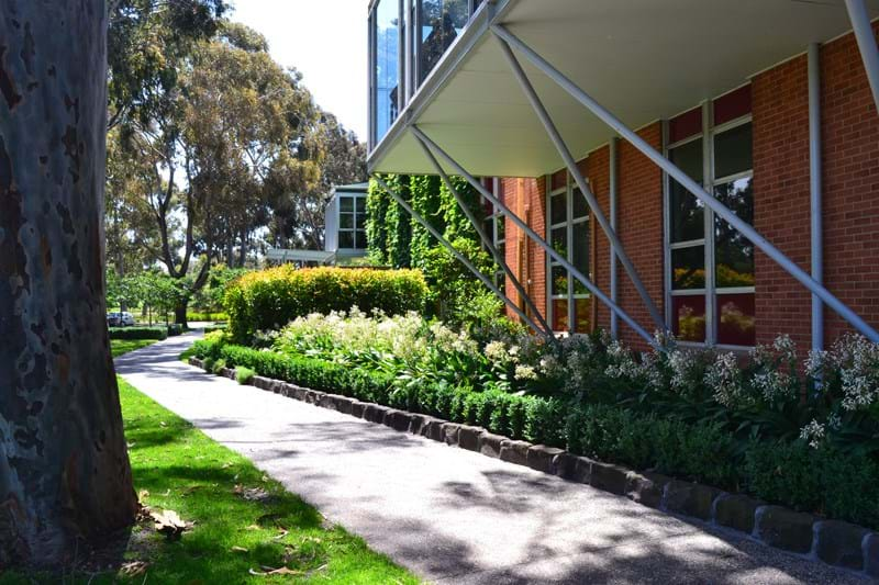 A photo of the stunning gardens at Haileybury College which showcase the quality wholesale plants that Dinsan Nursery produces.