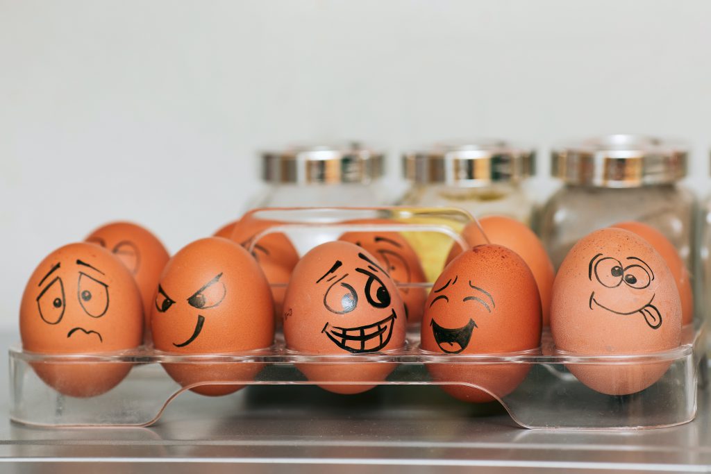 Eggs with different personalities drawn on them.