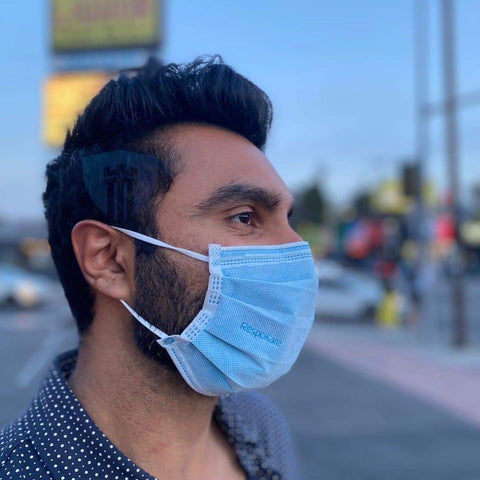 respokare mask antiviral worn by an adult male outside