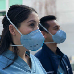 team of doctors wearing respokare n95 masks outside