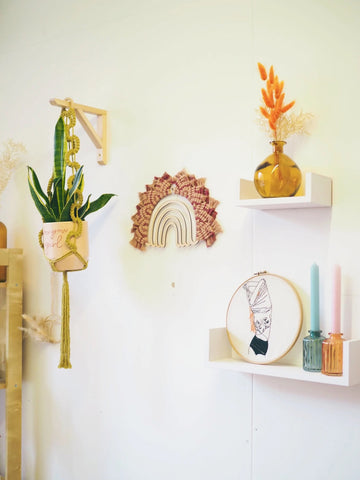 Boho macrame rainbow decor and hanging plants