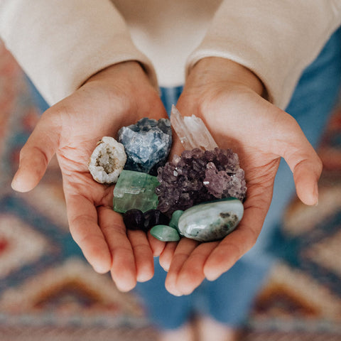 A handful of crystals of different colours and textures