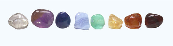 Seven chakra healing crystal tumble stones in a rainbow of colours