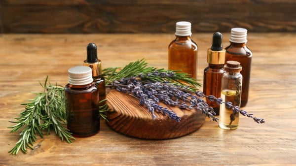 Aromatherapy Oils with sprigs of lavender and cypress