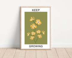 Keep growing picture with yellow flowers against a sage green background