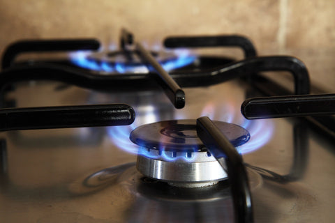 Gas stove emitting blue flame
