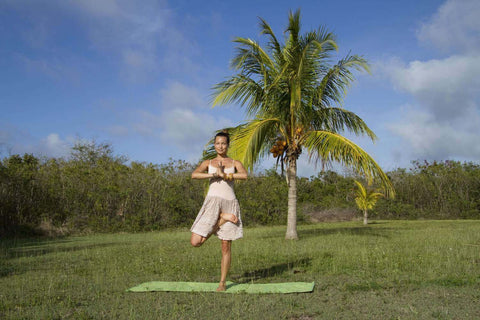 Woman doing yoga with Yogasana Mat