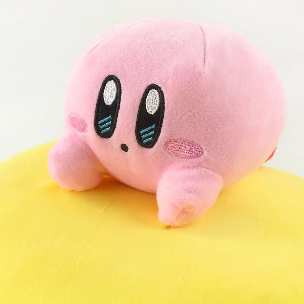 Peluche Kirby sur une étoile Géante