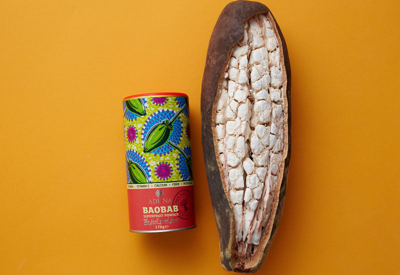  Aduna Baobab Fruit Powder and an opened baobab fruit
