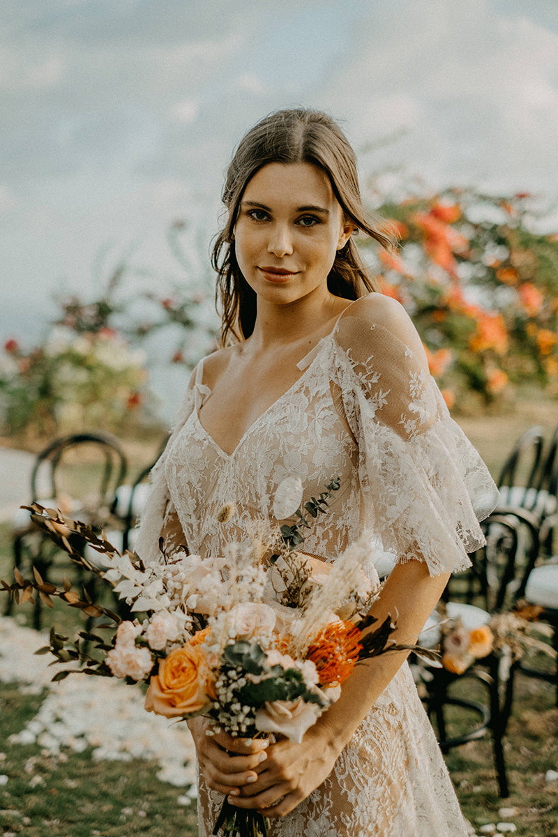 Bohemian lace wedding dress with off shoulder sleeves
