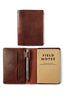 leather notebook and pen