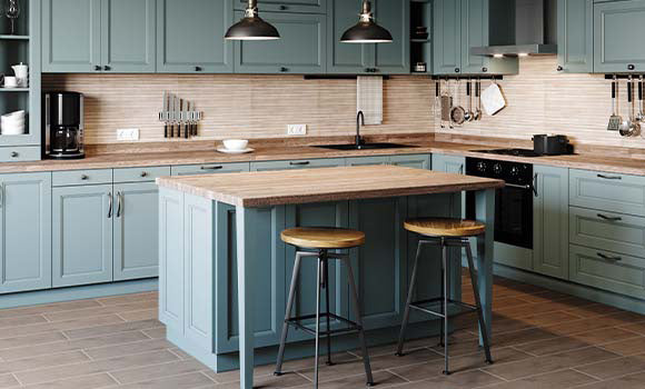 Retro-inspired bar stools make a chic addition to this vintage-style kitchen.