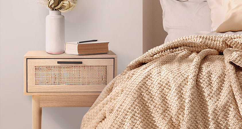 Featuring unique textures and natural tones, our Artiss one-drawer rattan bedside table immediately lends a natural and earthy feel to this neutral-themed bedroom.  