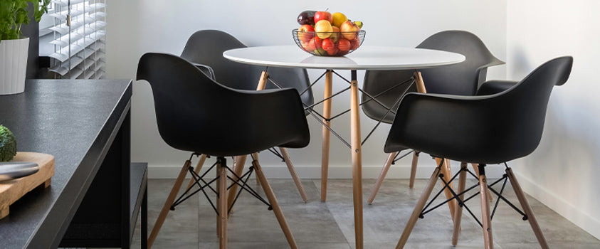 Combining style, durability, and function, the Artiss replica Eiffel round dining table paired with our Artiss DSW black dining chairs enhances this contemporary dining room décor.   
