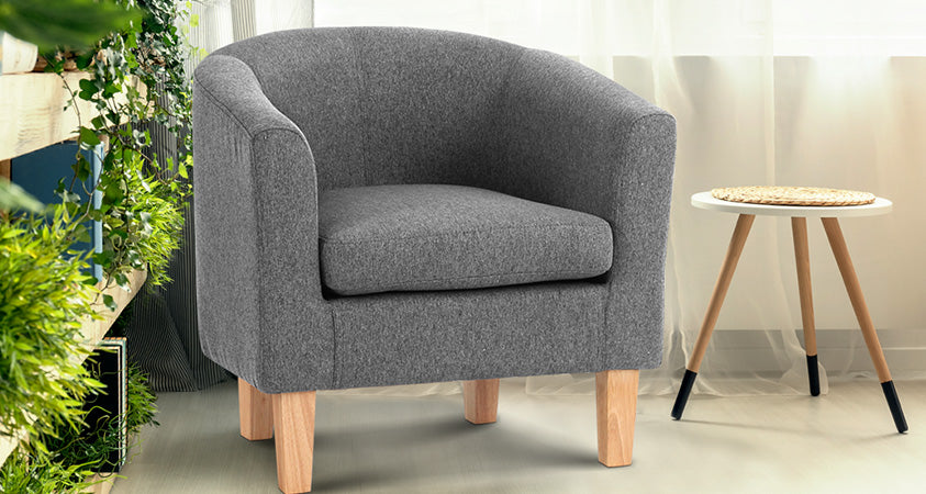 Flaunting modern style with clean lines and a simple profile, the Artiss Abby modern club armchair in grey perfectly blends in this bright and airy room. 