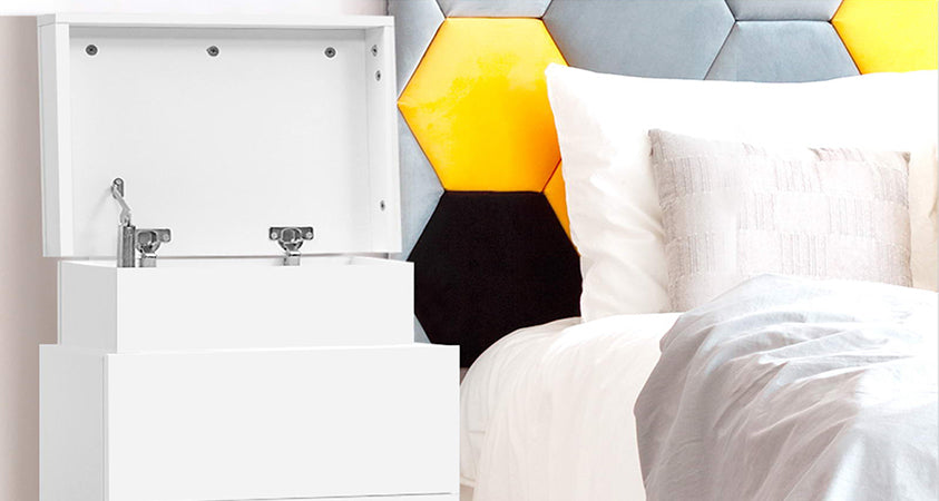 The Artiss lift-up two-drawer bedside table in white styled in a contemporary bedroom stands out from the mundane.  