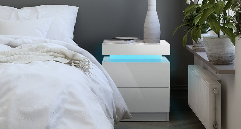 Our Artiss Coley two-drawer LED bedside table in white gives this bedroom a brand new look and feel with its contemporary and linear design.     