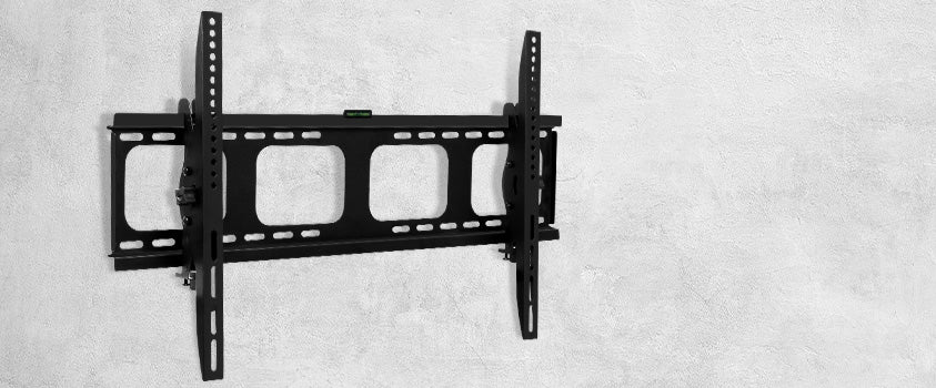 An Artiss black fixed wall mount bracket, installed on a concrete wall.