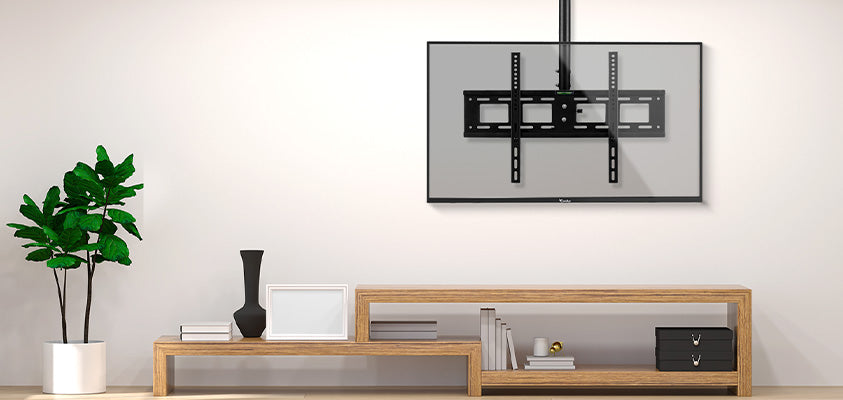 An Artiss ceiling mount bracket descending from the ceiling over a modern entertainment unit.