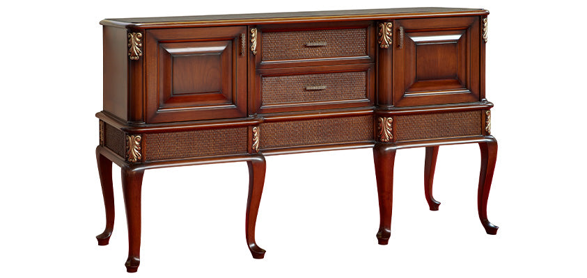 A traditional style lowboy with two cabinets and two drawers. It uses dark wood with shaped legs, 5 woven panels and brass fittings.