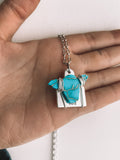 Turquoise Cow Head Necklace