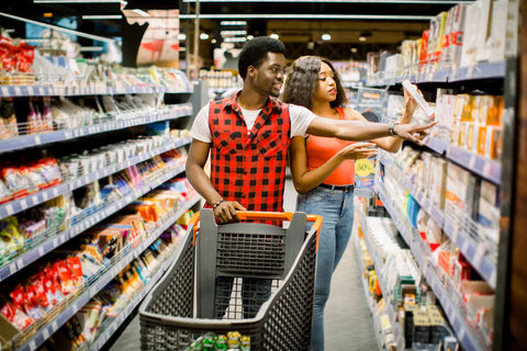 couple shopping in the grocery store for dinner date night