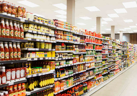 grocery store aisle filled with ingredients for a date night dinner