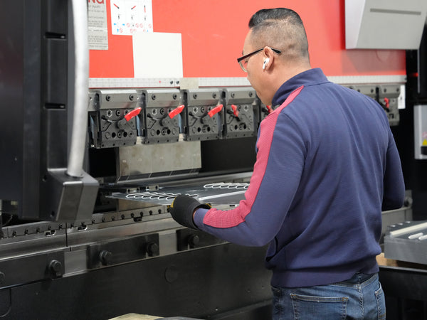 technician installing shield