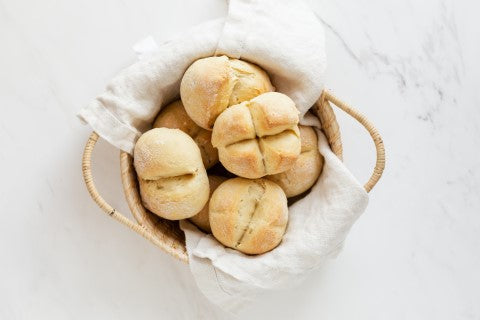 Homemade bread on pure white linen napkin yeast-free and no-knead