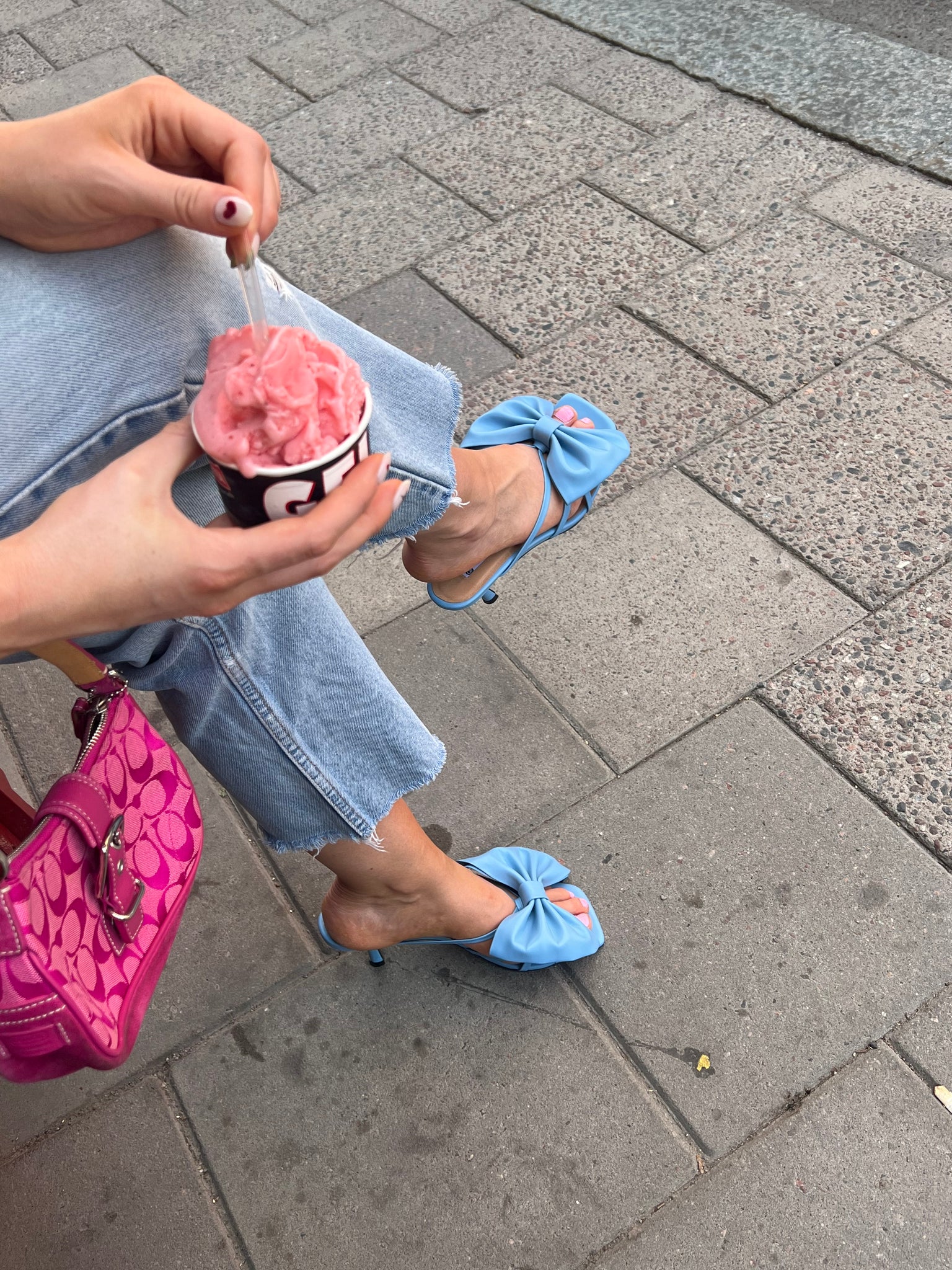 Mimmi Widstrand,the community manager & social media coordinator at Djerf Avenue, wearing Blankens heel The Jennie Blue bow