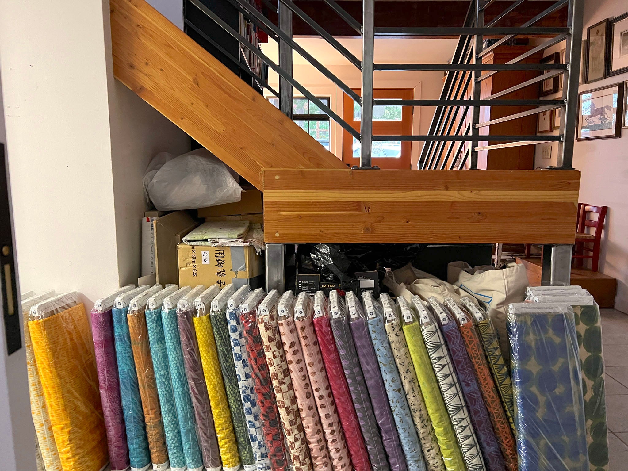 Fabric bolts in the studio of Marcia Derse