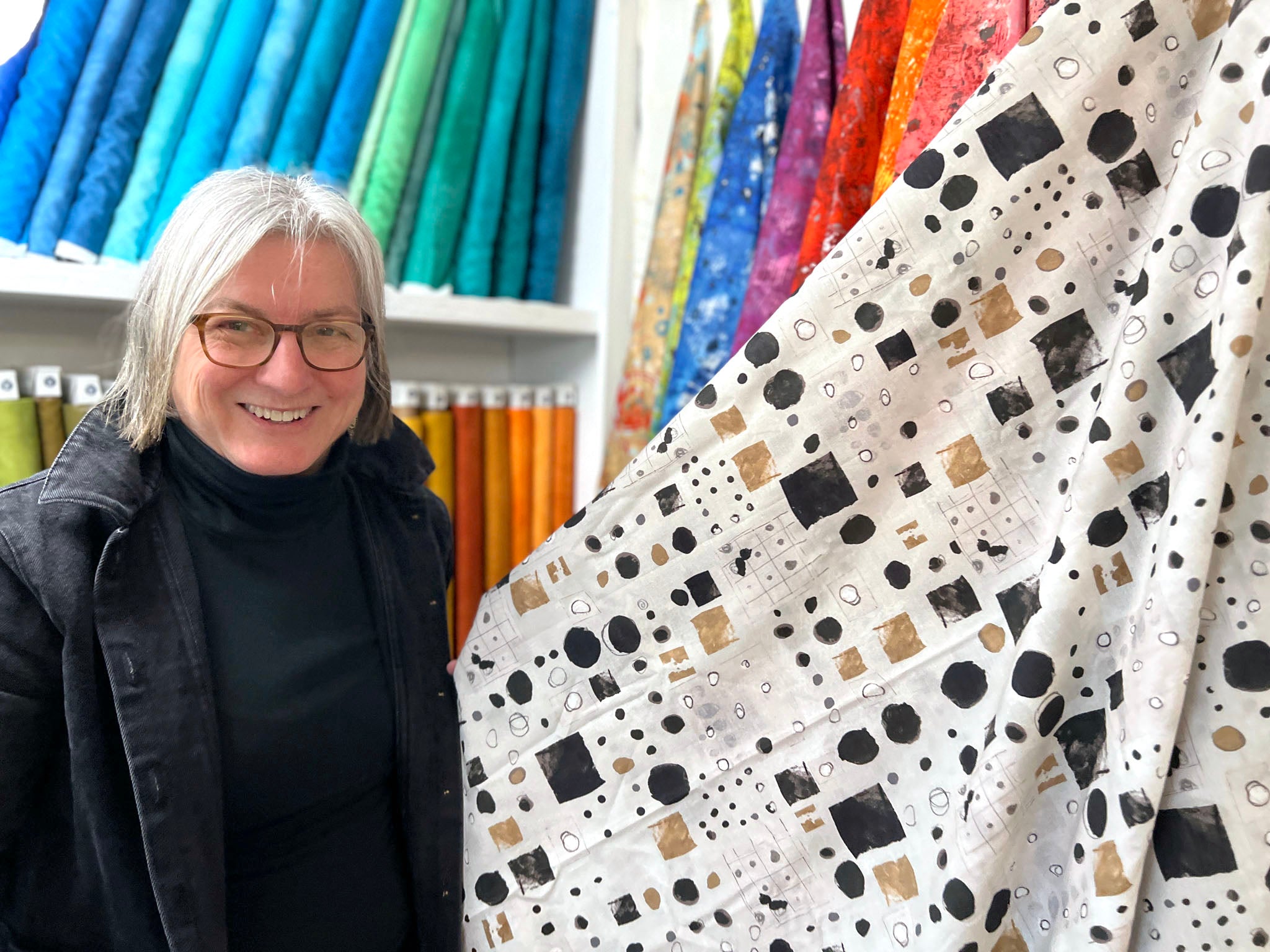Marcia Derse with her 108" wide backing fabric