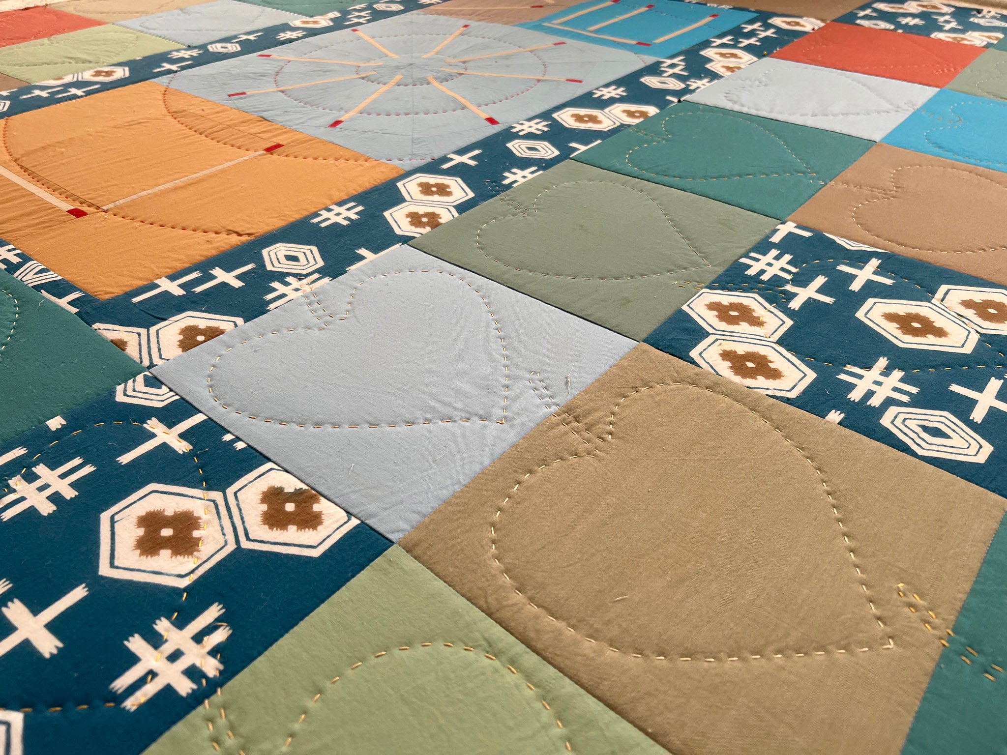 Quilt blocking process by Patricia Belyea of Okan Arts