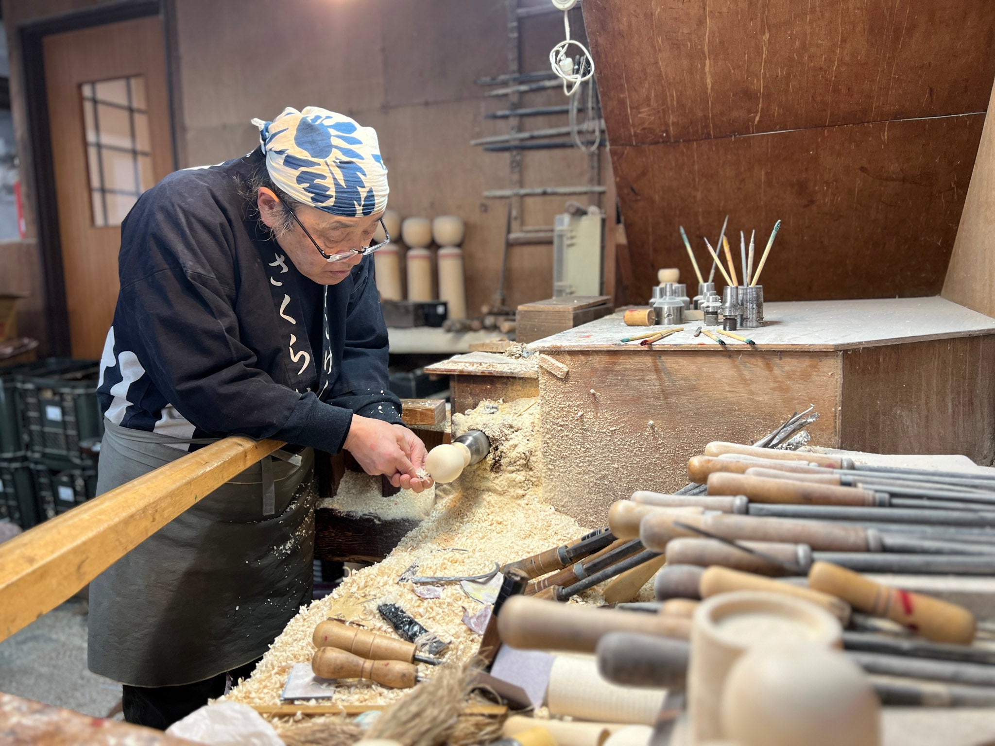 Akihiro Sakurai of Sakurai Kokeshi studio & shop in Naruko JP