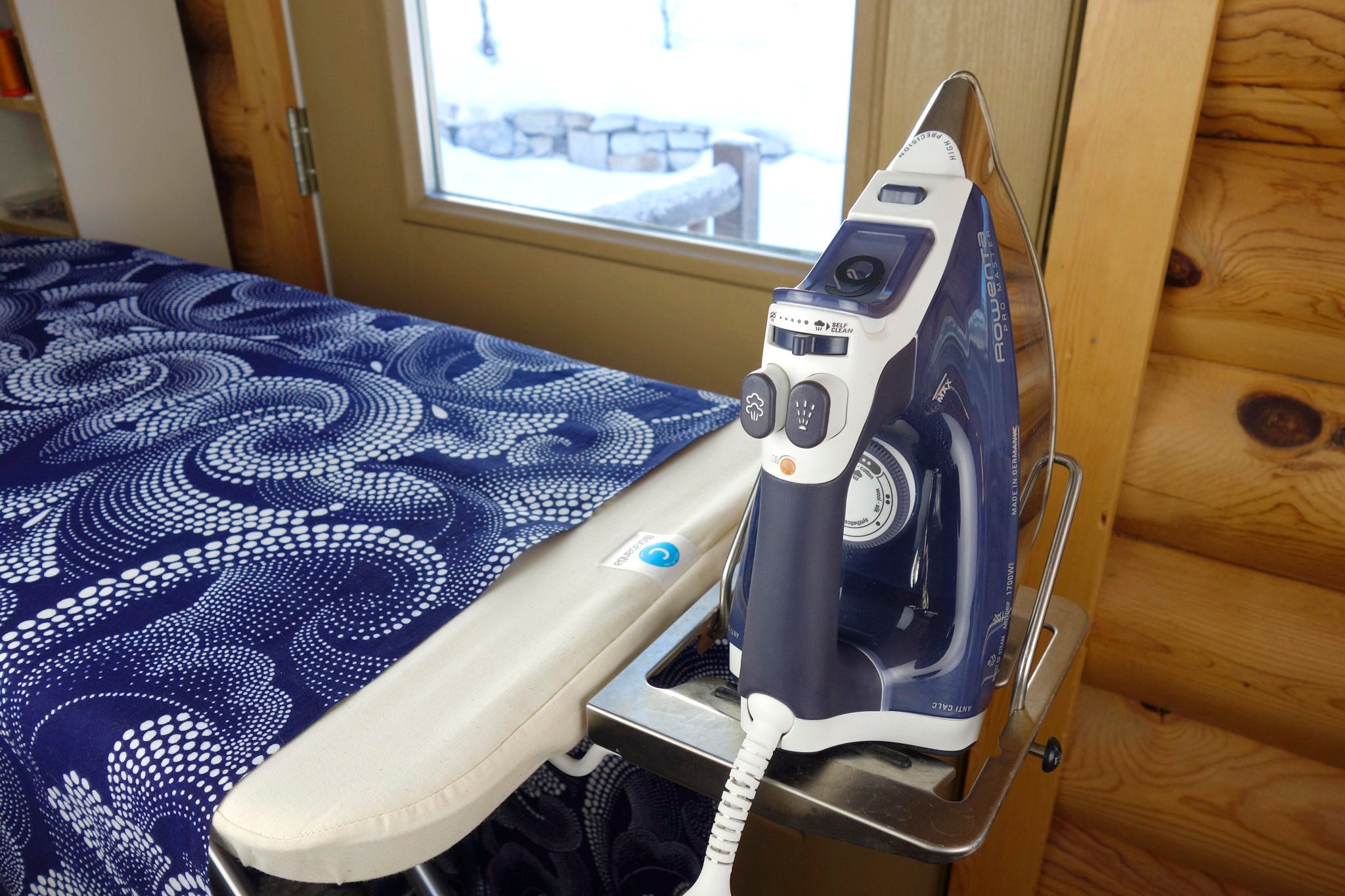 Brabantia ironing board with a Rowenta pro iron in the sewing studio of Patricia Belyea