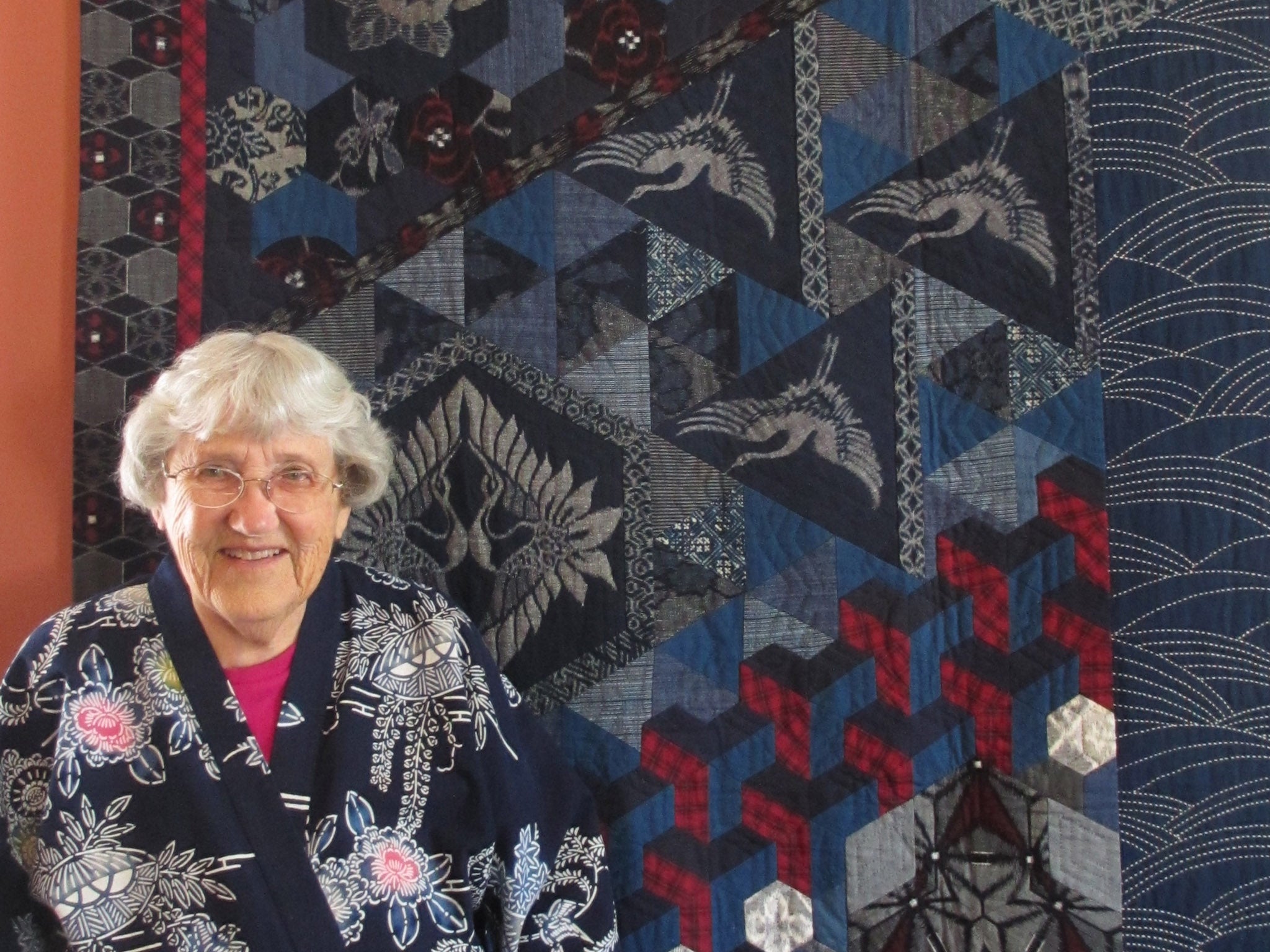 Kitty Pippen with Flight, a quilt made with Japanese textiles, May 2015