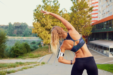 Image of a woman warming up before a run.