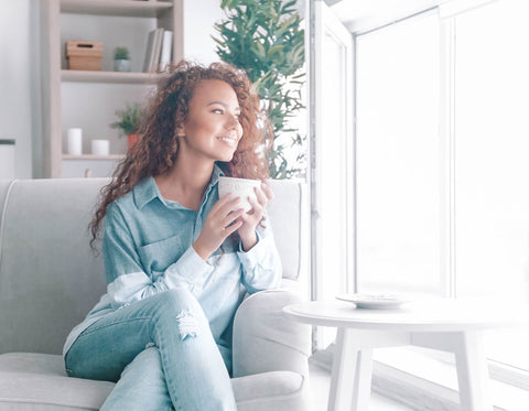 Mom Drinking Coffee on Couch