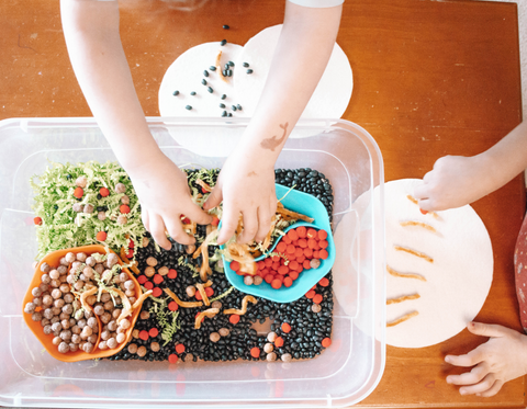 Kids playing with Taco Sensory Bin