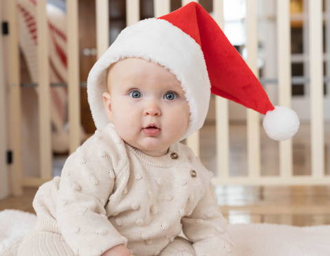 Baby Wearing a Santa Hat