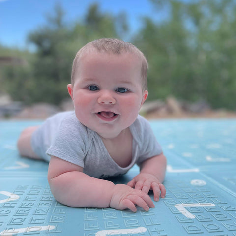 baby on a play mat