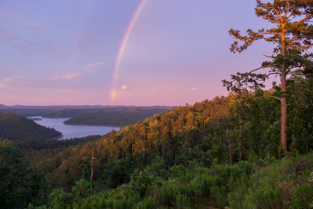 A View of Rainbow Over Lake and Mountains at Beavers Bend State Park Oklahoma