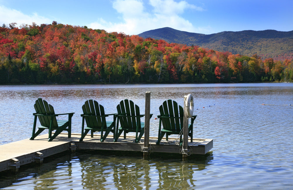 Adirondack Chairs on a Dock at Lake in Adirondack State Park New York