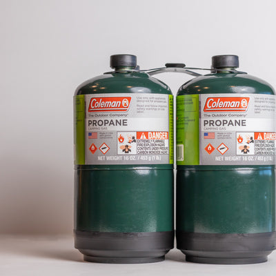 propane cans green and white perfect for camping 