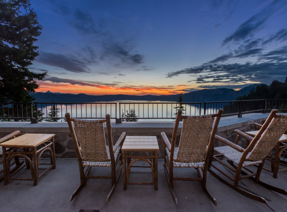 Rocking Chairs and Tables Overlooking Crater Lake in Crater Lake National Park