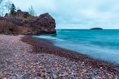 Rocky shoreline with view of Lake Superior at Black Beach Park in Tettegouche State Park